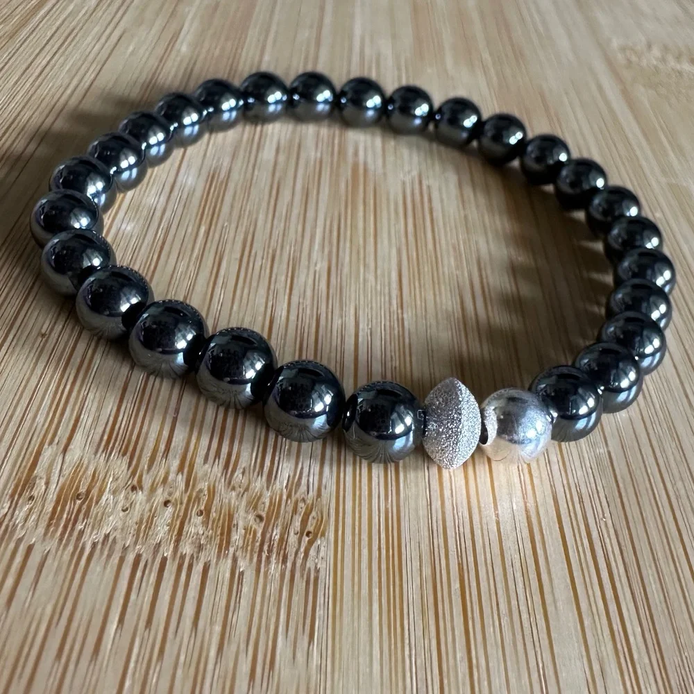 Polished 6mm Polished Jet Hematite Stretch Bracelet w/ Sterling Silver Spacers